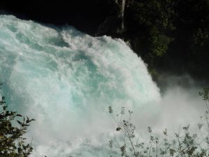 The powerful water falling over Huka Falls att Lake Taupo on the North Island