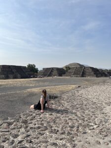 me sitting down enjoying the Teohiuacan ruins on the ultimate month in Mexico